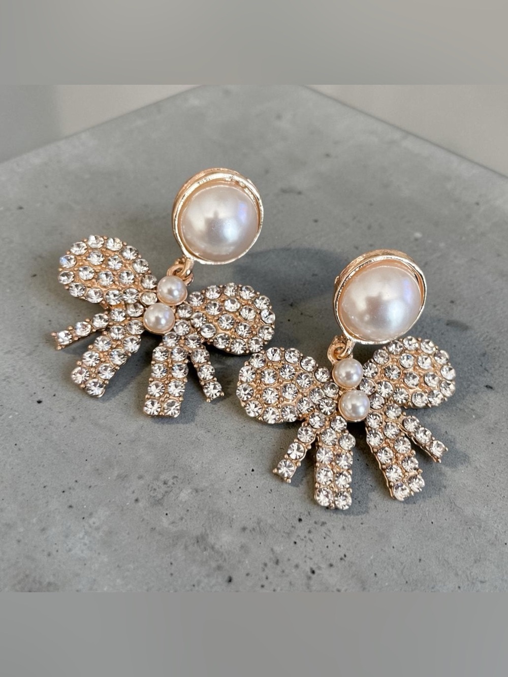 Elegant Pearl & Crystal Bow Drop Earrings - Gold Tone